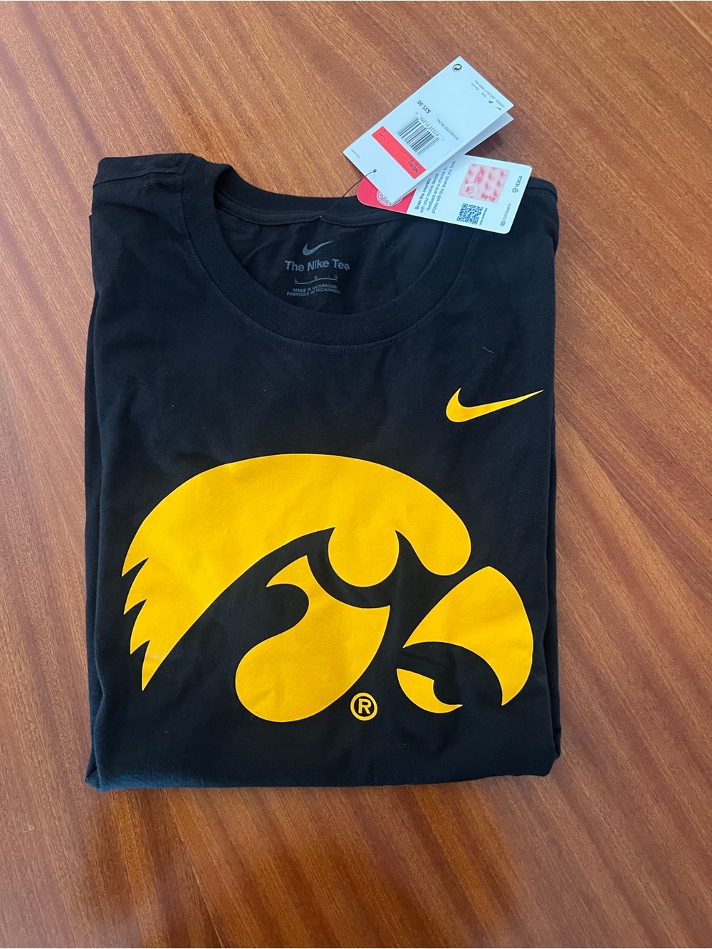 Nike Men's Black Short-Sleeve Tee with Yellow Hawkeye Logo